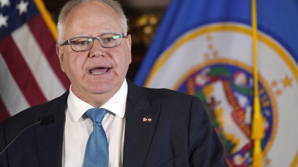 FILE - Minnesota Gov. Tim Walz speaks to the media in St. Paul, Minn., on Nov. 9, 2022