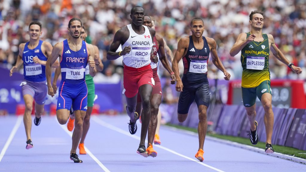 Marco Arop, of Canada, wins a men's 800-meter semifinal at the 2024 Summer Olympics in Saint-Denis, France, on Aug. 9, 2024