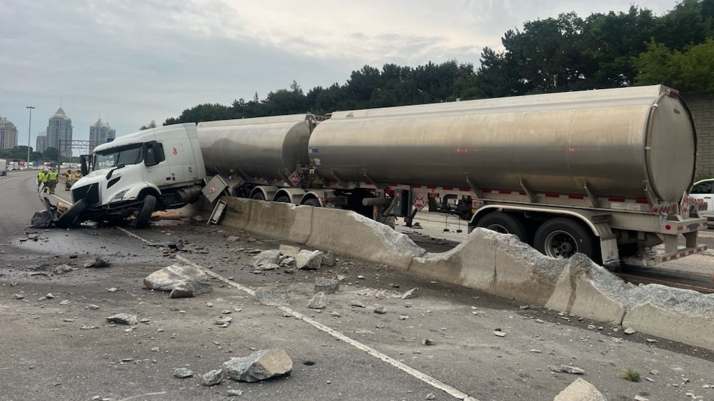 Eastbound lanes of Highway 401 in Toronto reopen after tractor-trailer crash, fuel spill