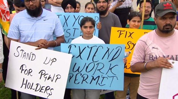 International students in Canada gather for a protest to call for support.