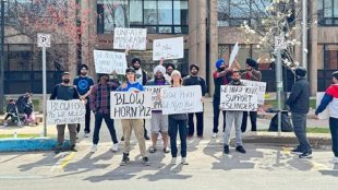 A protest is held by international students in Canada.