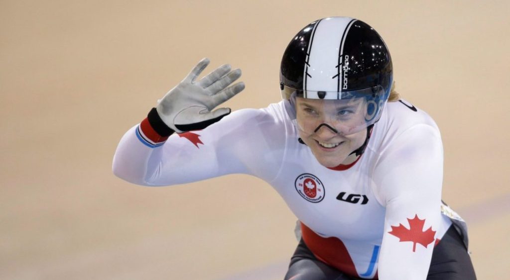 Canada's Kate O'Brien celebrates after the women's sprint quarterfinals track cycling competition at the Pan Am Games in Milton, Ontario, Saturday, July 18, 2015.