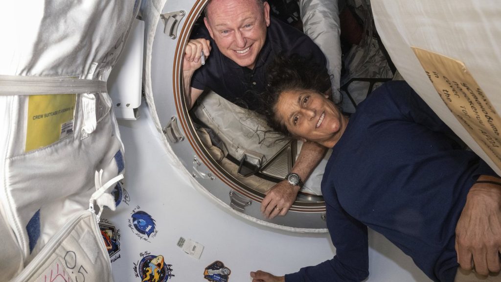 FILE - In this photo provided by NASA, Boeing Crew Flight Test astronauts Butch Wilmore, left, and Suni Williams are inside the vestibule between the forward port on the International Space Station's Harmony module and Boeing's Starliner spacecraft on June 13, 2024.