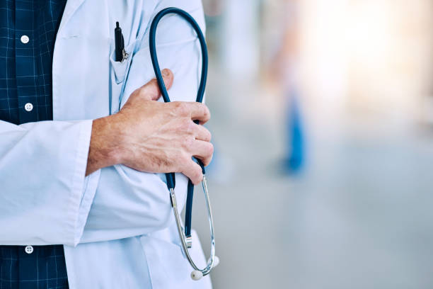 A doctor holding a stethoscope