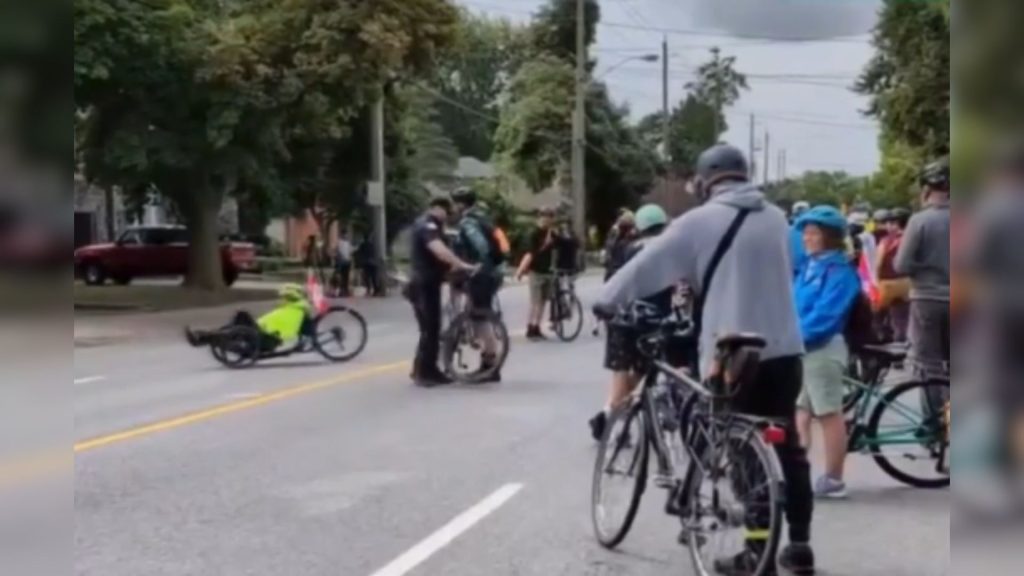 Heated exchange between cyclists and police caught on camera