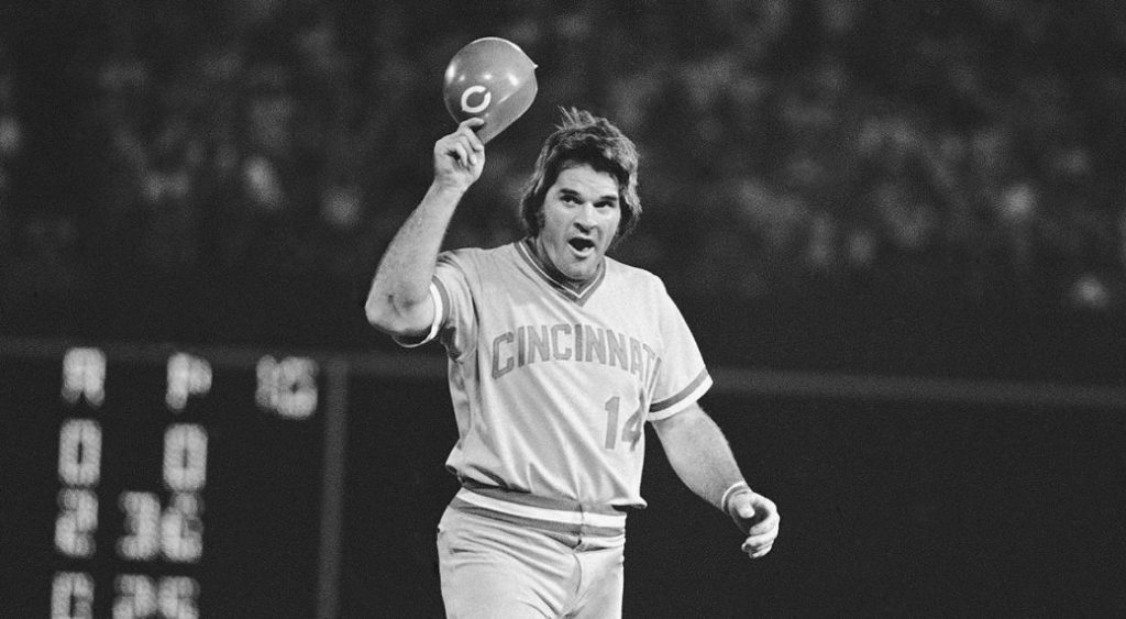 Cincinnati Reds third baseman Pete Rose tips his cap after hitting in his 44th straight game.