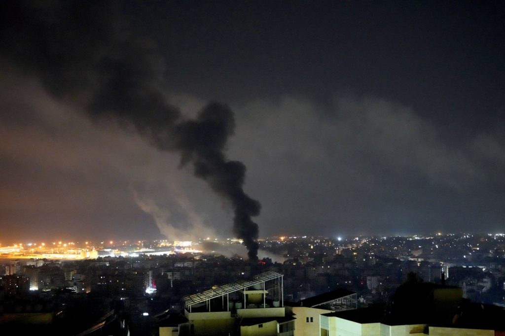 Air raid sirens sound in Tel Aviv shortly after Prime Minister Benjamin Netanyahu lands