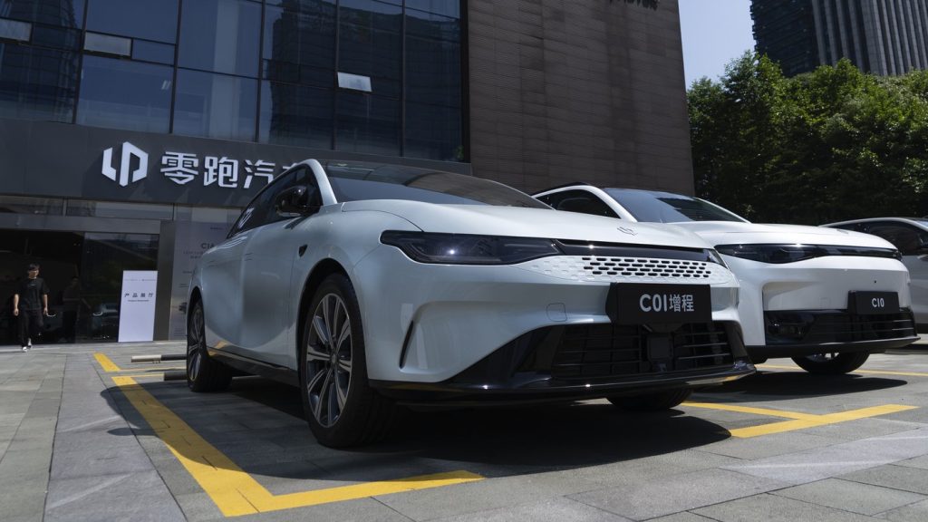 Leapmotor vehicles are parked outside a showroom in Hangzhou in eastern China's Zhejiang province May 14, 2024