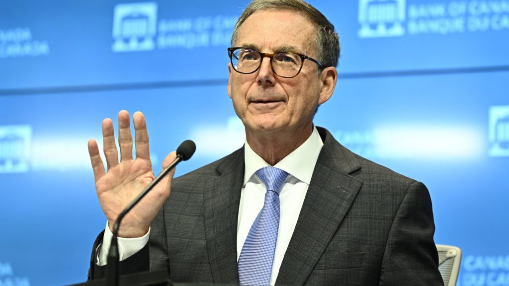 Bank of Canada Governor Tiff Macklem gestures during a news conference in Ottawa, on July 24, 2024