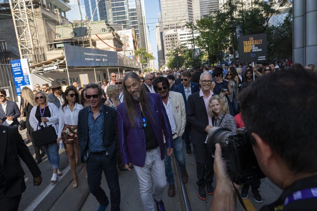 Tragically Hip fans belt out band's classics en masse as TIFF gets underway