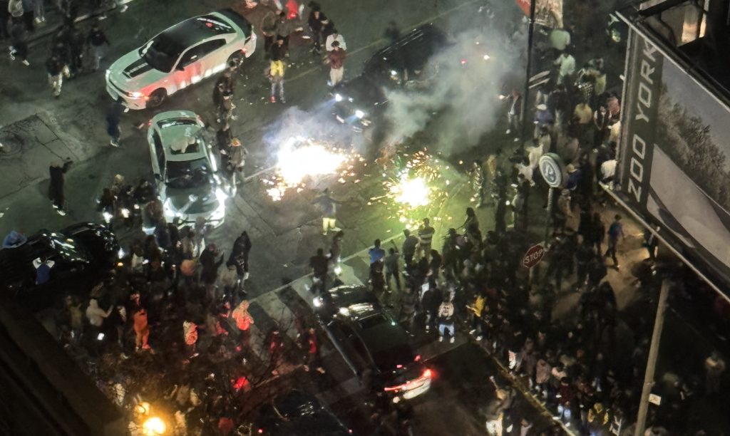 Video shows 'chaotic scene' at Yonge & Dundas on Halloween night as fireworks, cars take over intersection