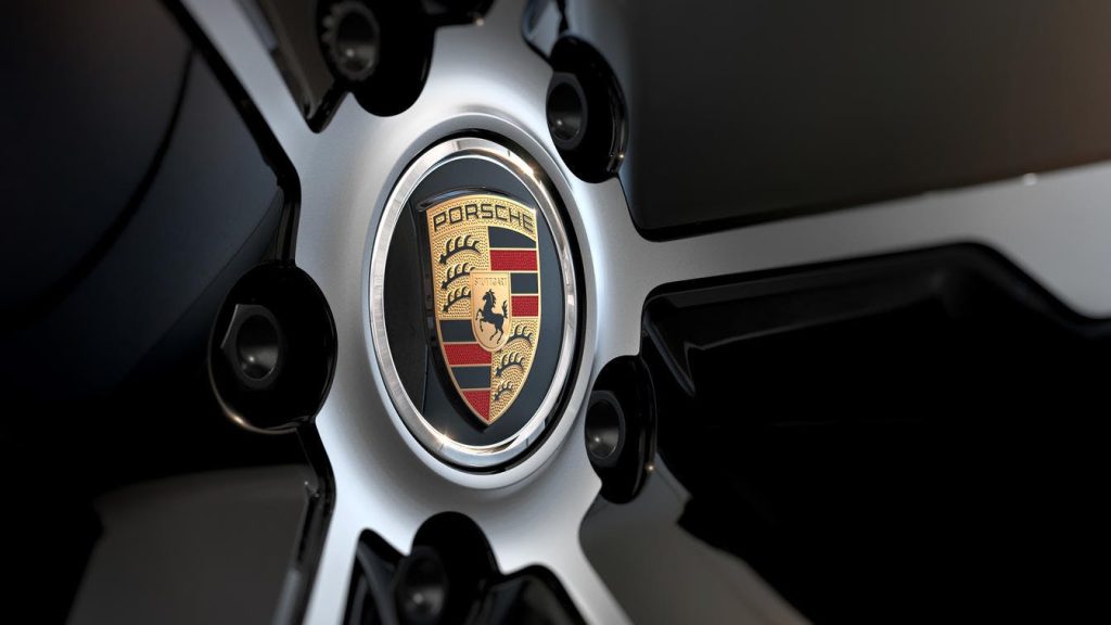 A wheel rim showing the Porsche logo