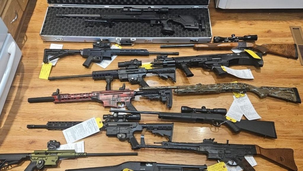 Firearms seized during search warrants executed by OPP.