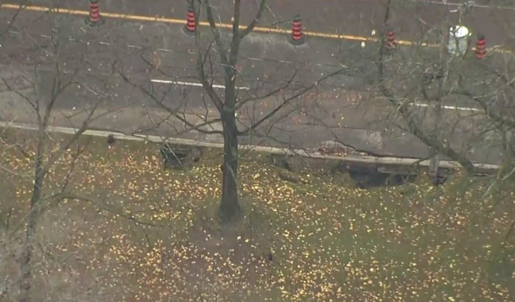 Large sinkhole shuts down Toronto's Parkside Drive after flooding