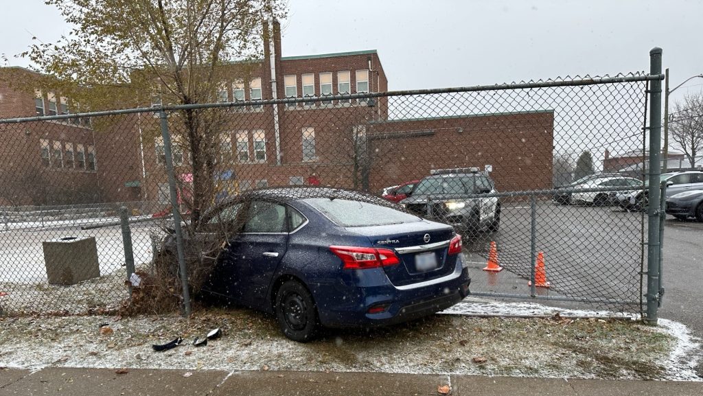 Toronto police say a driver crashed through a school fence near Dufferin Street and Lawrence Avenue on Dec. 4, 2024