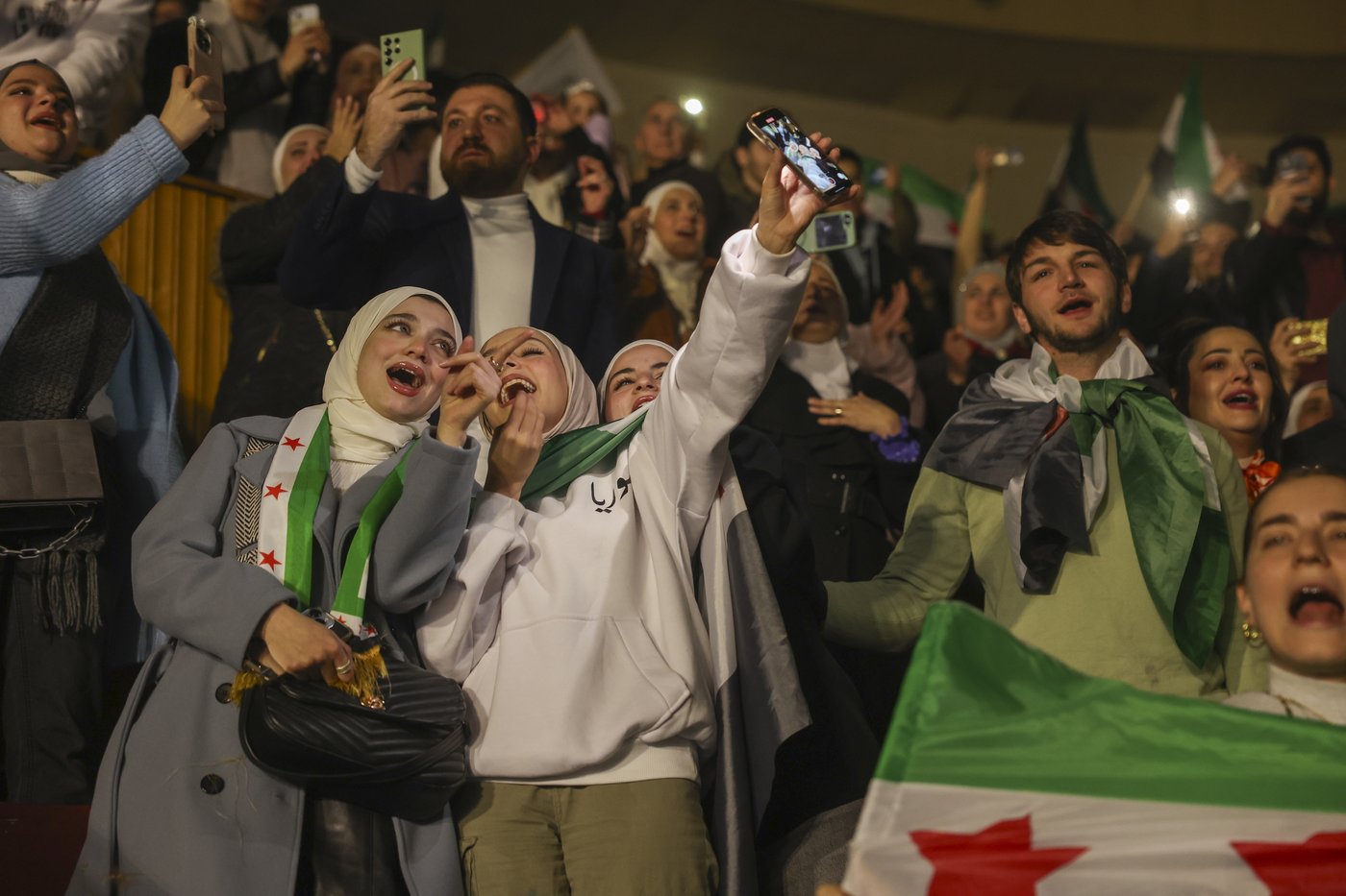 Syrians celebrate a month since Assad’s overthrow with revolutionary songs in Damascus