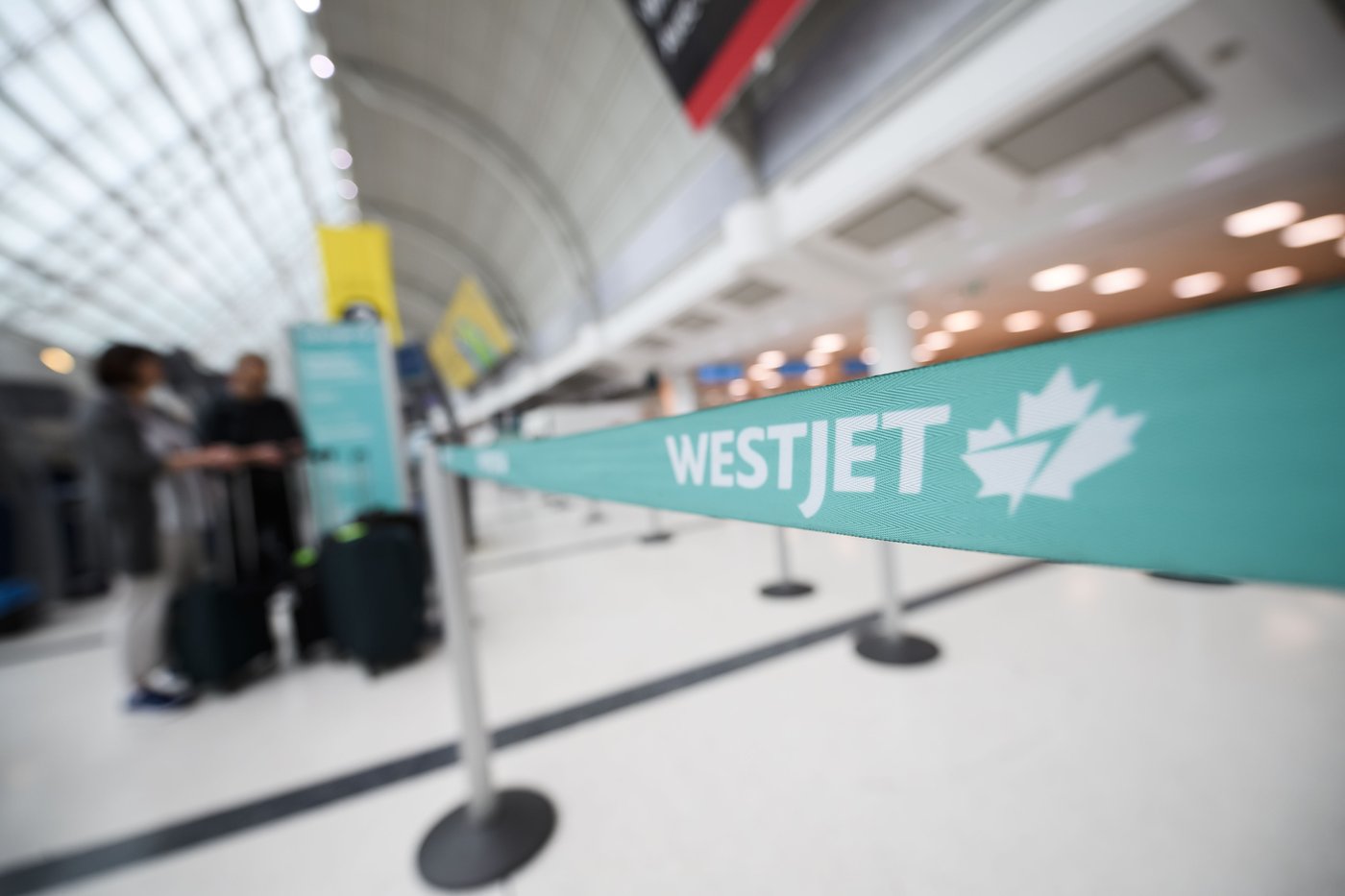 WestJet to add surcharge to some bookings and combine flights due to fuel costs