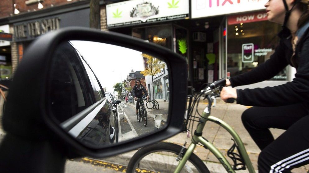 Bloor Street bike lane battle heats up as Etobicoke business owners sue city, local councillor