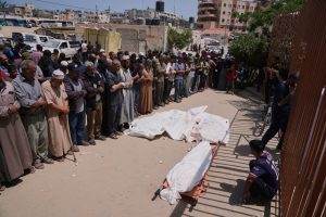 Israeli forces open fire a kilometer away from Gaza aid site, killing 3, health officials say