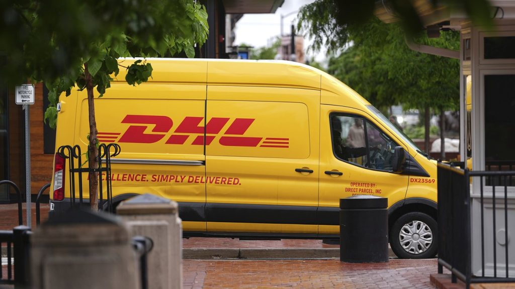 A DHL delivery van Tuesday, June 3, 2025, in Boulder, Colo. (AP Photo/David Zalubowski)