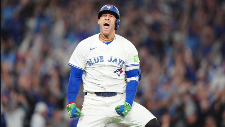 Blue Jays designated hitter George Springer celebrates after hitting a three-run home run against the Seattle Mariners in the seventh inning of Game 7 of the American League Championship Series in Toronto on Monday, Oct. 20, 2025. THE CANADIAN PRESS/Frank Gunn.