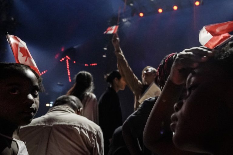 Nearly 400 new Canadians from 65 countries gather at a ceremony in Toronto to take the oath of citizenship on Friday, July 19, 2024. THE CANADIAN PRESS/Chris Young