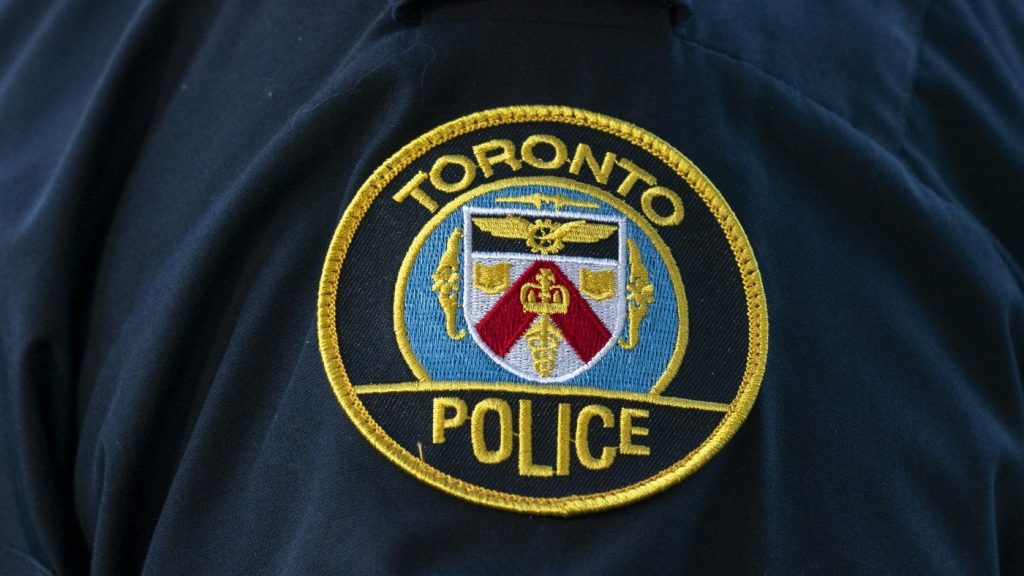 A Toronto Police Service shoulder badge is shown in this undated photo. THE CANADIAN PRESS/Spencer Colby