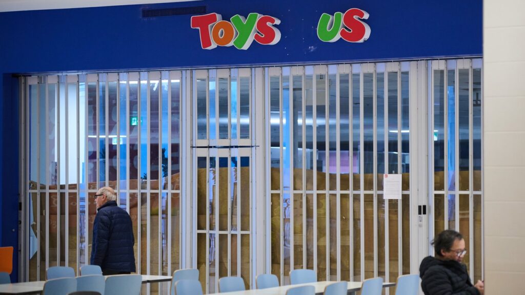 Shoppers pass a permanently closed Toys 'R' Us store in Toronto, on Wednesday, Feb. 4, 2026. THE CANADIAN PRESS/Sammy Kogan
