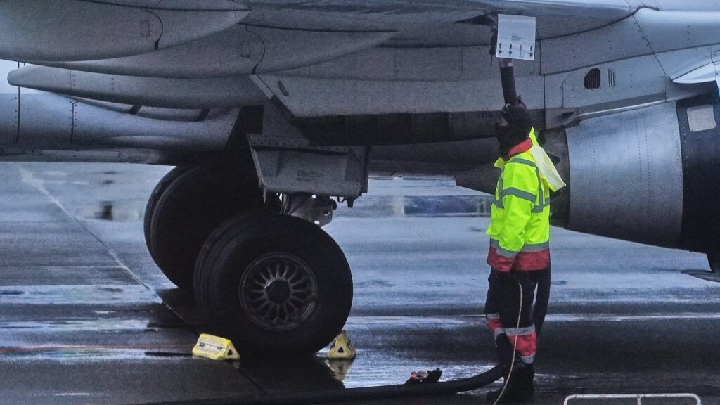 FILE - An airplane is refueled at Seattle-Tacoma International Airport in SeaTac, Wash., on Sunday, Nov. 23, 2025. (AP Photo/Lindsey Wasson, File)