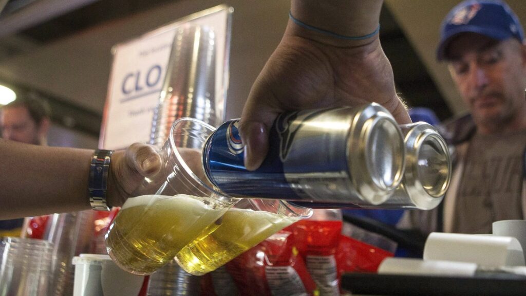 FILE PHOTO. Canned beers are poured into a plastic glass at a vending stand at the Rogers Centre ahead of American League Division Series action between the Toronto Blue Jays and Texas Rangers in Toronto on Sunday, October 9, 2016. THE CANADIAN PRESS/Chris Young
