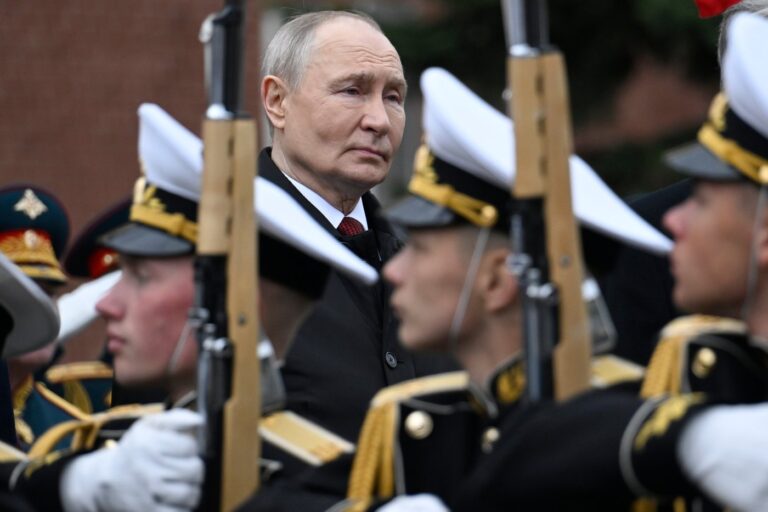 Russian President Vladimir Putin, centre foreground, attends a ceremony to lay flowers at the Tomb of the Unknown Soldier by the Kremlin wall inMoscow, Saturday, May 9, 2026, during celebrations of the 81st anniversary of the Soviet Union's victory over Nazi Germany during the World War II. (Alexander Nemenov/Pool Photo via AP)