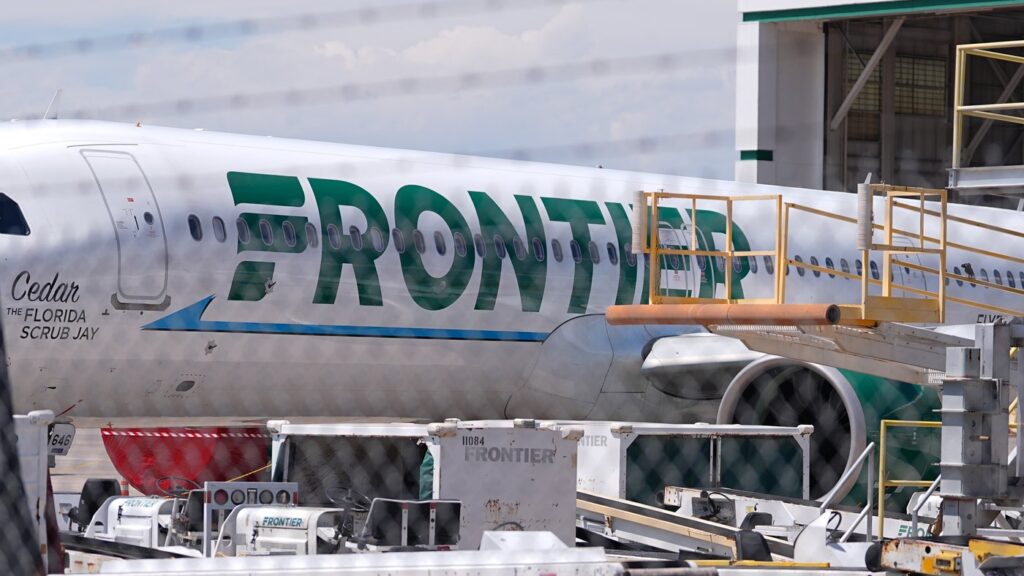 Frontier Airlines jetliner number n646fr sits outside the airlines technical operations center with other jetliners in for service north of Denver International Airport Saturday, May 9, 2026, in Denver. (AP Photo/David Zalubowski)