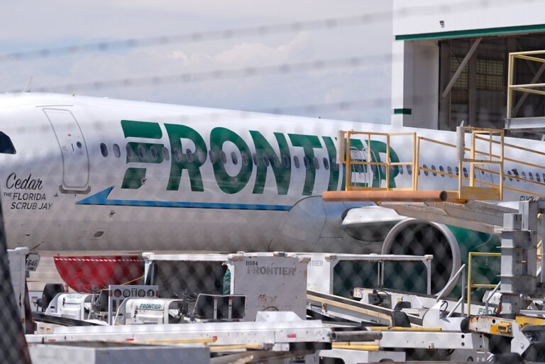 Frontier Airlines jetliner number n646fr sits outside the airlines technical operations center with other jetliners in for service north of Denver International Airport Saturday, May 9, 2026, in Denver. (AP Photo/David Zalubowski)