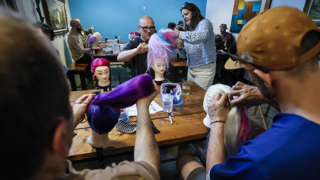 Beers, braids and bonding: Hairstyle classes for dads aim to challenge gender norms