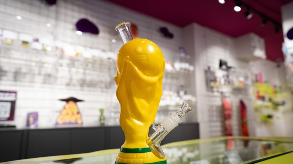 A bong resembling the FIFA World Cup trophy is displayed at Cosmic Charlies on Queen Street West in Toronto on Thursday, June 4, 2026. THE CANADIAN PRESS/Arlyn McAdorey