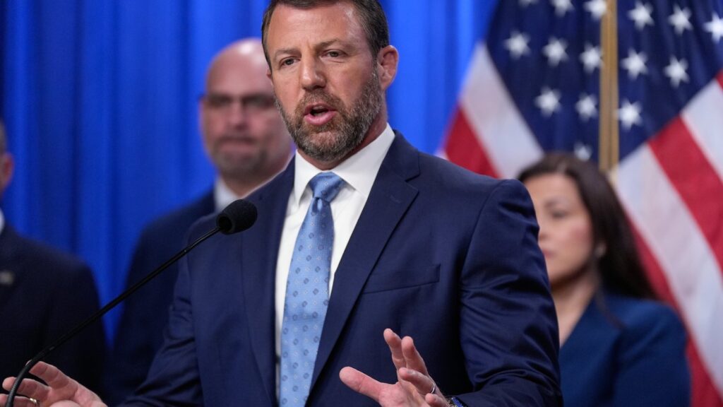 Homeland Security Secretary Markwayne Mullin speaks during a news conference on unaccompanied children at the Justice Department Thursday, June 11, 2026, in Washington. (AP Photo/Manuel Balce Ceneta)