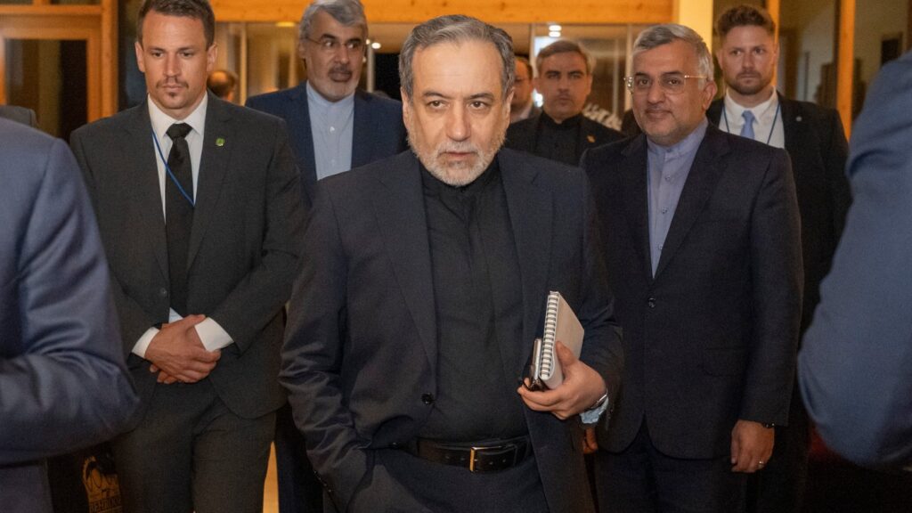 Iranian Foreign Minister Seyyed Abbas Araghchi, center, arrives at the Buergenstock resort in Obbuergen, near Lucerne, Switzerland, early Sunday, June 21, 2026. (Urs Flueeler/Keystone, Pool via AP)