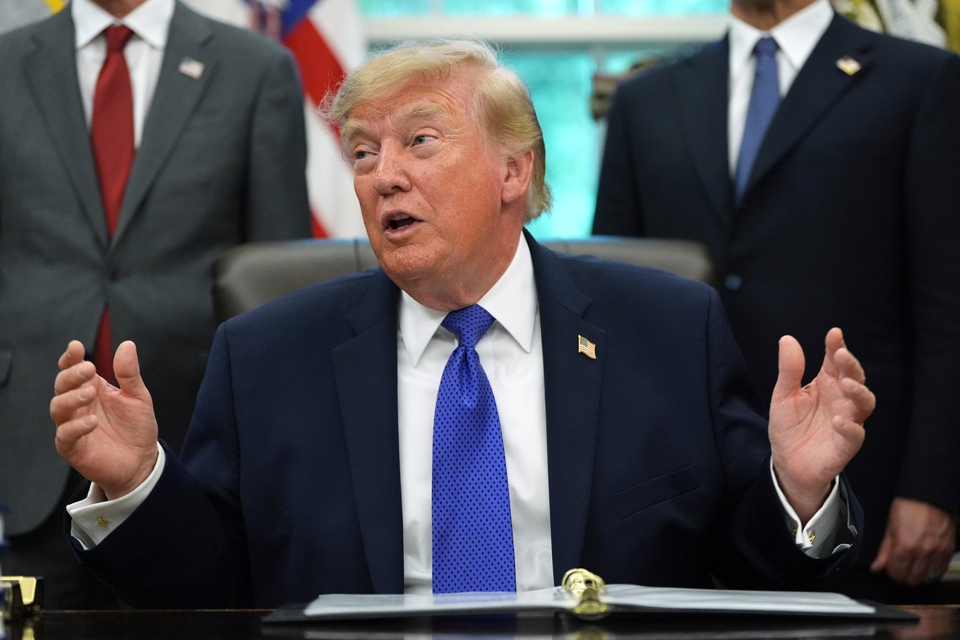 Trump’s import bans on Canadian liquor, whey, motorcycles take effect